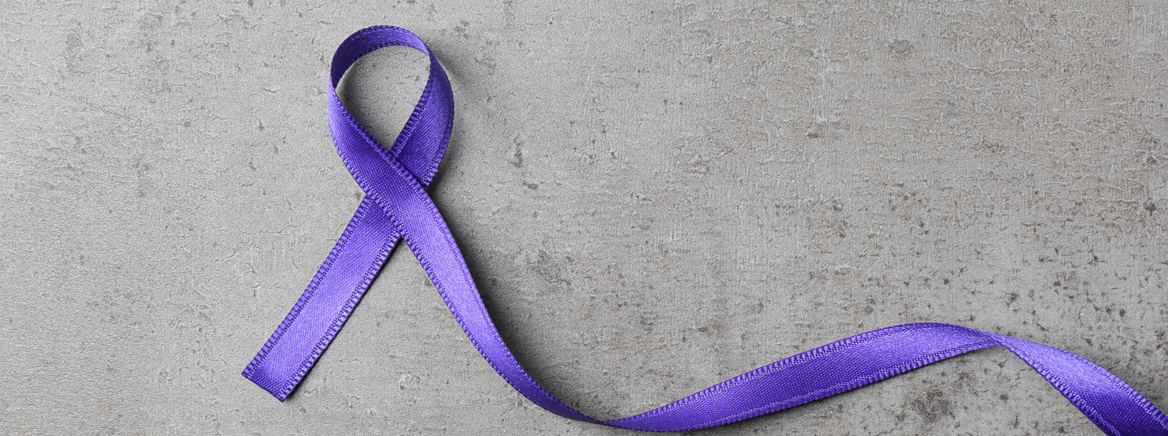 A purple ribbon for showing support in the fight against domestic violence.